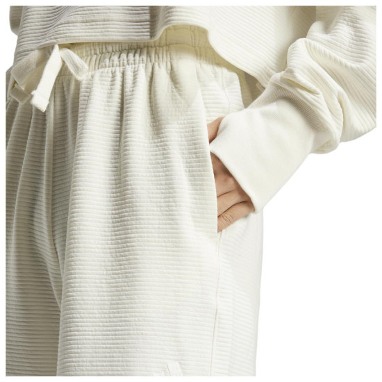 Adidas Γυναικείο παντελόνι φόρμας All SZN Rib 7/8-Length Wide-Leg Pants